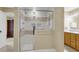 Modern bathroom with a large walk-in shower and double vanity at 202 Needlerush Rd, Kiawah Island, SC 29455