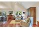 Spacious living area with hardwood floors, a comfortable seating area, and large windows at 202 Needlerush Rd, Kiawah Island, SC 29455