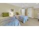 Cozy bedroom with two twin beds, nightstands and ample closet space at 202 Needlerush Rd, Kiawah Island, SC 29455