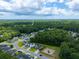 Community overview showcasing houses, roads, and lush green surroundings at 166 Blackstone Dr, Moncks Corner, SC 29461