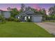 One-story house with gray siding, blue door, and attached garage at 166 Blackstone Dr, Moncks Corner, SC 29461