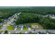 Aerial view of suburban neighborhood with tree-lined streets at 166 Blackstone Dr, Moncks Corner, SC 29461