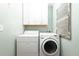 Laundry room with washer, dryer, and cabinets at 166 Blackstone Dr, Moncks Corner, SC 29461