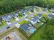 Bird's-eye view of a residential neighborhood with houses and green spaces at 166 Blackstone Dr, Moncks Corner, SC 29461