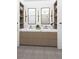 Modern bathroom with double vanity, marble countertops, and ample storage at 211 Seven Farms Dr # 301, Charleston, SC 29492