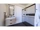Clean bathroom with walk-in shower, floating vanity, and modern fixtures at 211 Seven Farms Dr # 301, Charleston, SC 29492