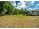 Large backyard with deck and screened porch at 3820 Gardenhill Rd, Mount Pleasant, SC 29429
