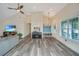 Bright entry with wood-look floors, bench, and overhead lighting at 3820 Gardenhill Rd, Mount Pleasant, SC 29429