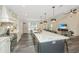 Modern kitchen with marble countertops and a large island at 3820 Gardenhill Rd, Mount Pleasant, SC 29429
