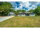 Ranch style home with attached garage and spacious lawn at 3820 Gardenhill Rd, Mount Pleasant, SC 29429