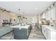 Open concept kitchen with a large island and white cabinets at 3820 Gardenhill Rd, Mount Pleasant, SC 29429