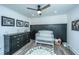 Adorable Bedroom featuring a crib, dresser, and alphabet rug at 3820 Gardenhill Rd, Mount Pleasant, SC 29429