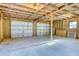 Unfinished garage interior with double doors and ample space at 3820 Gardenhill Rd, Mount Pleasant, SC 29429