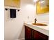 Small bathroom with copper sink, updated vanity, and gold mirror at 1720 Live Oak Park, Seabrook Island, SC 29455