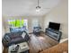 Spacious living room with hardwood floors and views to backyard at 1720 Live Oak Park, Seabrook Island, SC 29455