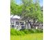 Houses surrounded by lush greenery near a tranquil marsh at 1720 Live Oak Park, Seabrook Island, SC 29455
