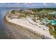 Aerial view of beach, resort clubhouse, and pool area at 1720 Live Oak Park, Seabrook Island, SC 29455