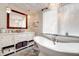 Charming bathroom with a freestanding bathtub and shiplap walls at 1720 Live Oak Park, Seabrook Island, SC 29455