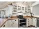 Modern kitchen with stainless steel appliances and granite countertops at 1720 Live Oak Park, Seabrook Island, SC 29455