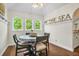 Bright dining area with round table and chairs near the kitchen at 1720 Live Oak Park, Seabrook Island, SC 29455