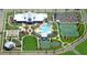 Aerial view of community amenities including clubhouse, pool, and tennis courts at 253 River Martin Ct, Summerville, SC 29483