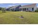 Community backyard with multiple homes and fence at 253 River Martin Ct, Summerville, SC 29483