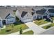 Gray house with white garage door and landscaping in a neighborhood at 253 River Martin Ct, Summerville, SC 29483