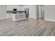 Open kitchen with stainless steel appliances and island at 253 River Martin Ct, Summerville, SC 29483