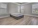 Bright bedroom with hardwood floors and multiple windows at 253 River Martin Ct, Summerville, SC 29483
