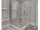 Modern bathroom with a large glass shower and tile surround at 253 River Martin Ct, Summerville, SC 29483