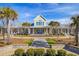 Community clubhouse with welcoming front porch and landscaping at 253 River Martin Ct, Summerville, SC 29483