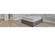 Spacious bedroom with gray platform bed and wood-look flooring at 253 River Martin Ct, Summerville, SC 29483