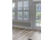 Sunroom with white shutters and access to backyard at 253 River Martin Ct, Summerville, SC 29483