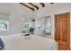 King sized bed, dresser, and window with blinds in bright bedroom at 40 Morris St, Charleston, SC 29403