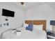 Comfortable bedroom with a queen-size bed and a flat-screen TV at 40 Morris St, Charleston, SC 29403