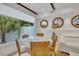 Bright dining area with round table and chairs near living room at 40 Morris St, Charleston, SC 29403