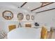 Open living area with white sectional and dining table at 40 Morris St, Charleston, SC 29403