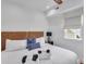 King bed with wicker headboard in bright bedroom at 40 Morris St, Charleston, SC 29403