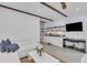 Open living room with white sofa, kitchen, and modern appliances at 40 Morris St, Charleston, SC 29403