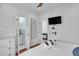 King bed, dresser, and en-suite bathroom with walk-in shower at 40 Morris St, Charleston, SC 29403