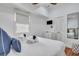 Spacious bedroom with a queen bed, dresser, and nearby bathroom access at 40 Morris St, Charleston, SC 29403