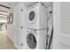 Convenient laundry room with stacked washer and dryer at 40 Morris St, Charleston, SC 29403