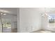 Bright dining room with hardwood floors and chandelier at 123 Ashley Cove Way, Summerville, SC 29483