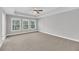 Main bedroom with carpet, ceiling fan and windows at 403 Green Fern Dr, Summerville, SC 29483