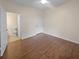 Spacious bedroom with hardwood floors and an ensuite bathroom at 45 Sycamore Ave # 1417, Charleston, SC 29407