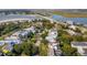 Aerial view of a coastal community with waterfront homes and lush landscaping at 108 Carolina Blvd, Isle of Palms, SC 29451