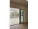 Interior view with sliding glass doors opening to deck and backyard at 4416 Oakwood Ave, North Charleston, SC 29405