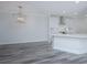 Modern kitchen with white cabinets and a large island at 420 Carolina Cherry Ct # 203, Charleston, SC 29414