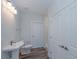 Simple bathroom with a pedestal sink, toilet, and shower at 420 Carolina Cherry Ct # 203, Charleston, SC 29414
