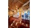 Living room with hardwood floors and a view of the kitchen at 3001 Buccaneer Rd, Isle of Palms, SC 29451